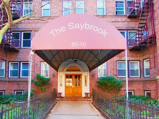 85-10 34th Ave Unit 421, Jackson Heights, NY 11372 - property entrance featuring brick siding