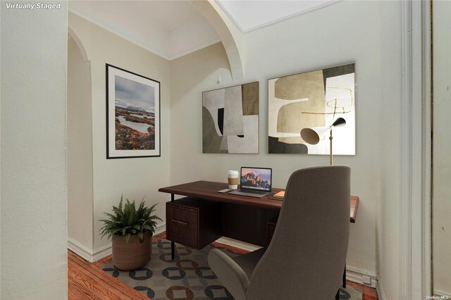 office featuring hardwood / wood-style floors and ornamental molding