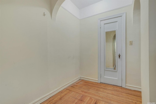 unfurnished room with light hardwood / wood-style flooring