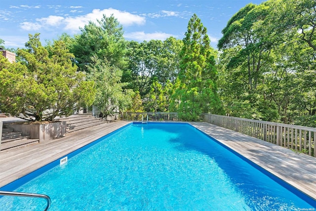 view of pool featuring a deck