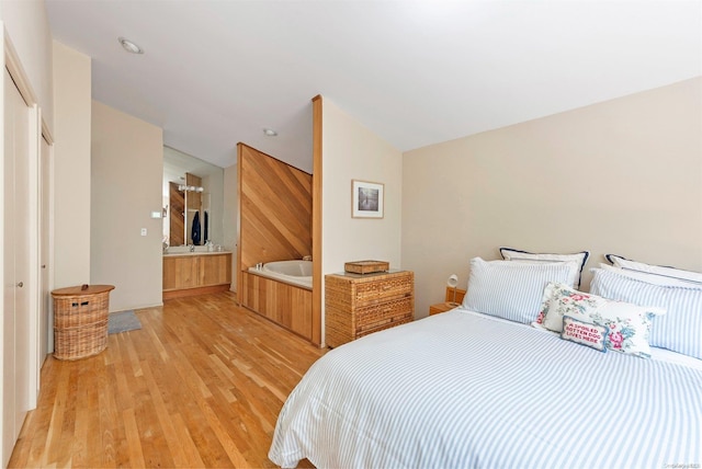 bedroom featuring light wood-type flooring