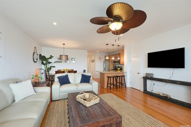 living room with light hardwood / wood-style flooring