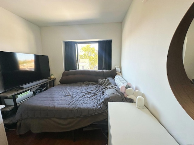 bedroom featuring wood-type flooring