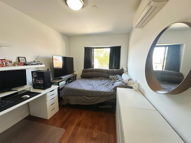 bedroom with dark wood-type flooring and a wall mounted air conditioner