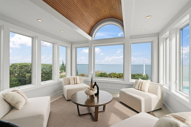 sunroom with a water view