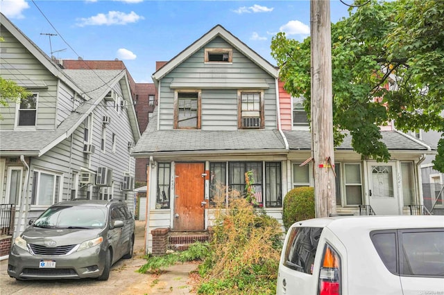 view of front of property with washer / clothes dryer