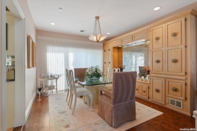 dining space featuring hardwood / wood-style floors