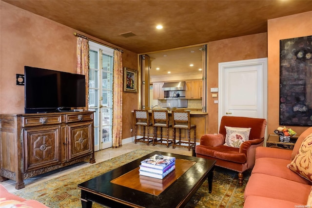 living room featuring tile patterned flooring