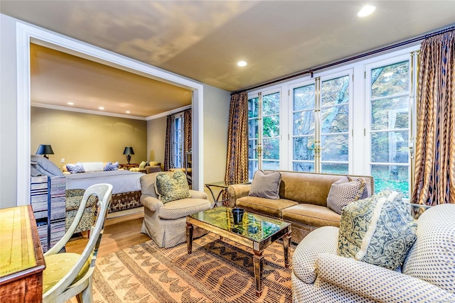 interior space with crown molding and hardwood / wood-style flooring