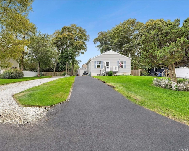 view of front of home with a front yard