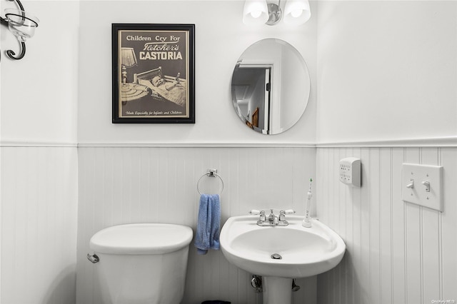 bathroom with toilet and sink