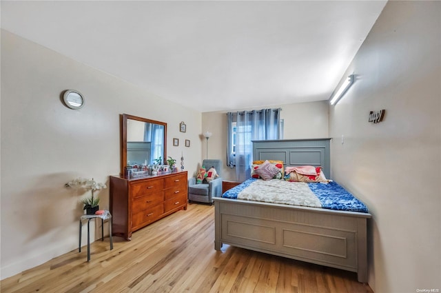 bedroom featuring light hardwood / wood-style floors