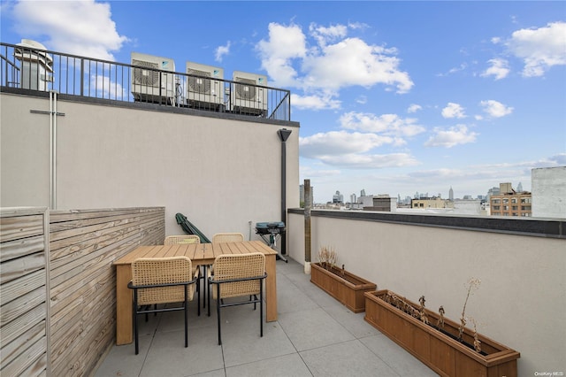 view of patio with a balcony and grilling area