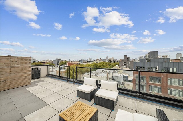 view of patio / terrace with a balcony