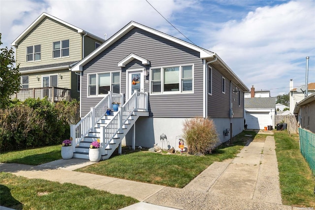 view of front facade with a front lawn