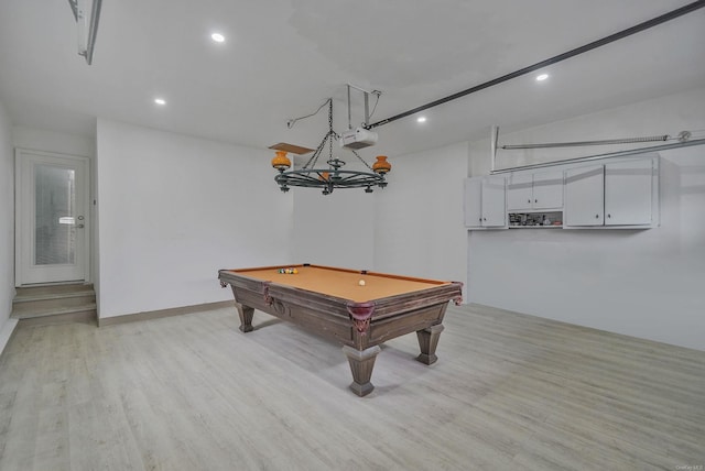 rec room featuring light wood-style flooring, a garage, billiards, and recessed lighting