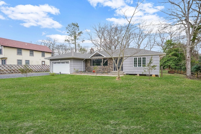 ranch-style home with a garage, aphalt driveway, fence, and a front lawn