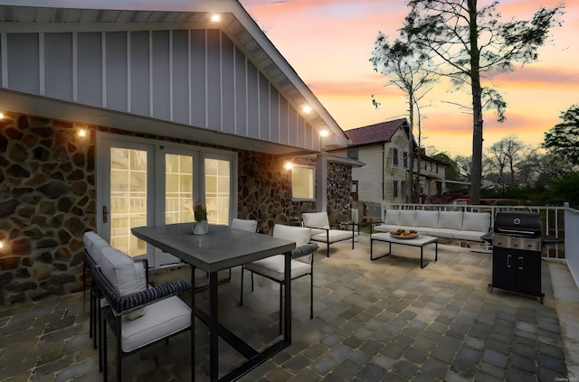 view of patio with outdoor lounge area, outdoor dining area, and area for grilling