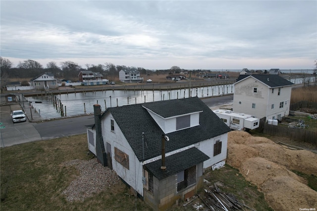 drone / aerial view with a water view