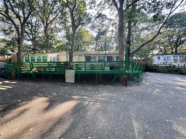 56 Woodcliff Trl, Baiting Hollow, NY 11933 - manufactured / mobile home featuring a wooden deck