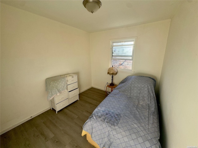 56 Woodcliff Trl, Baiting Hollow, NY 11933 - bedroom with dark wood-type flooring and baseboards