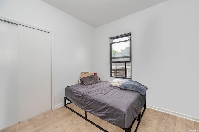 bedroom with light wood-type flooring