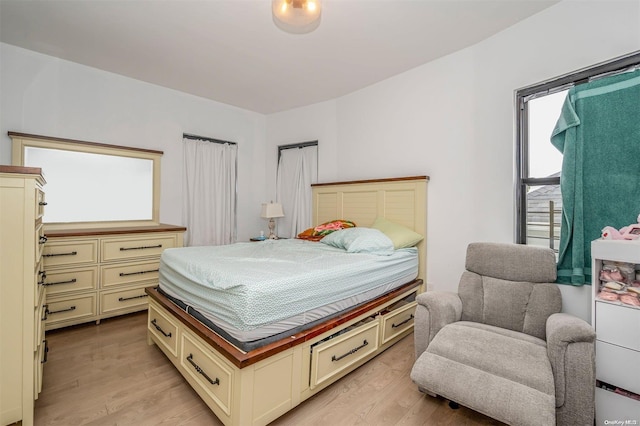 bedroom with light hardwood / wood-style floors