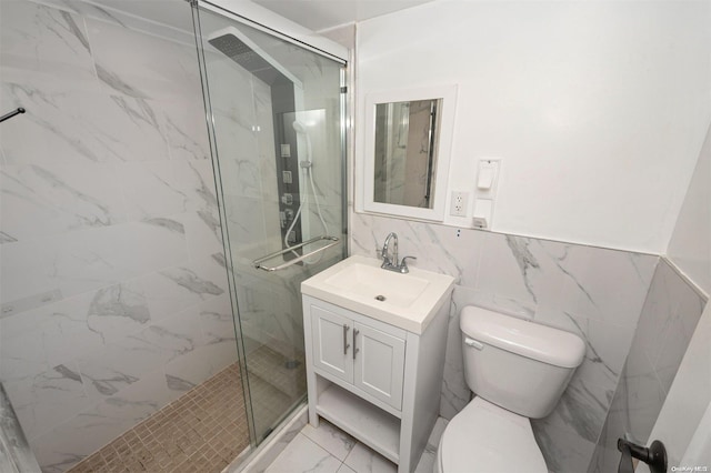 bathroom with an enclosed shower, vanity, toilet, and tile walls