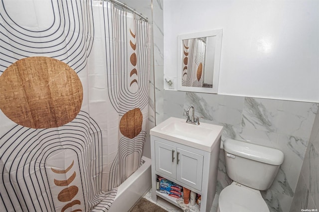 full bathroom with shower / bath combo with shower curtain, vanity, tile walls, and toilet