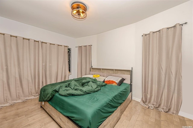 bedroom featuring hardwood / wood-style flooring