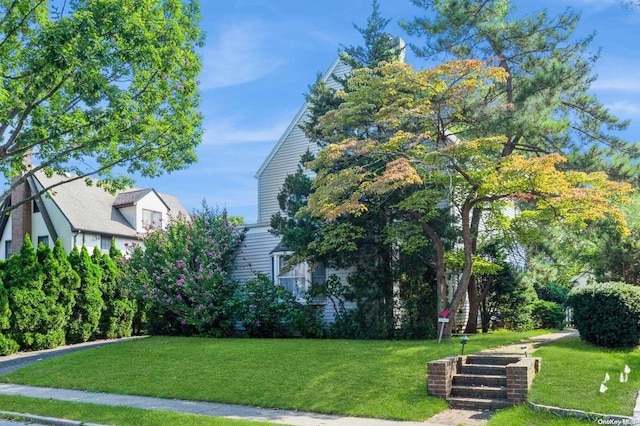 exterior space featuring a lawn