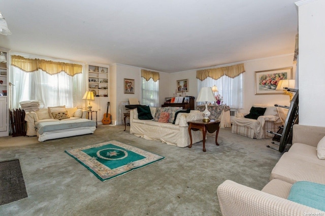 living room featuring carpet flooring and a healthy amount of sunlight