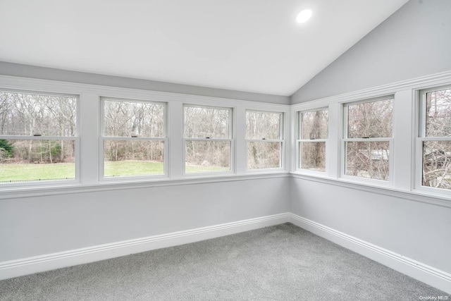 unfurnished sunroom featuring lofted ceiling