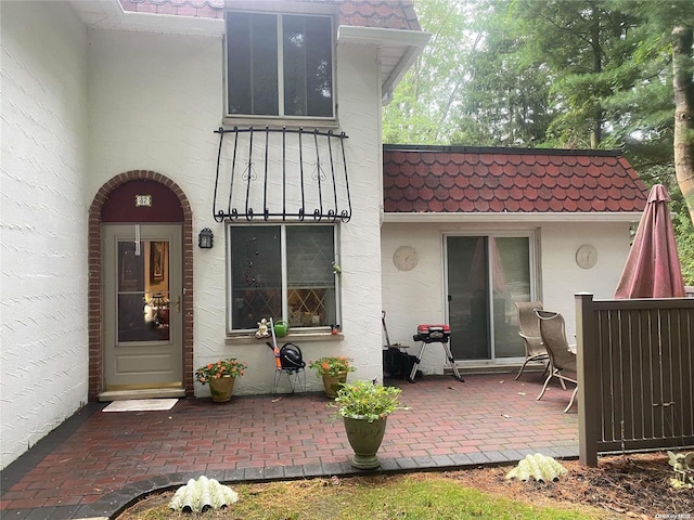 back of house featuring a patio area