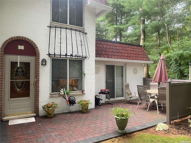 back of house with a patio area