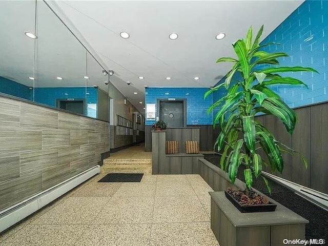 129 Bch 118th St Unit 6F, Rockaway Park, NY 11694 - corridor featuring baseboard heating and recessed lighting
