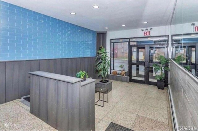 129 Bch 118th St Unit 6F, Rockaway Park, NY 11694 - building lobby with recessed lighting and wainscoting
