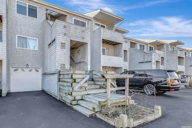 exterior space with a garage