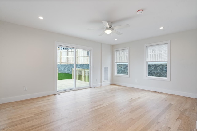 unfurnished room with ceiling fan and light hardwood / wood-style floors