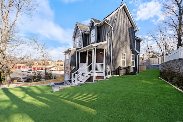 view of home's exterior featuring a yard