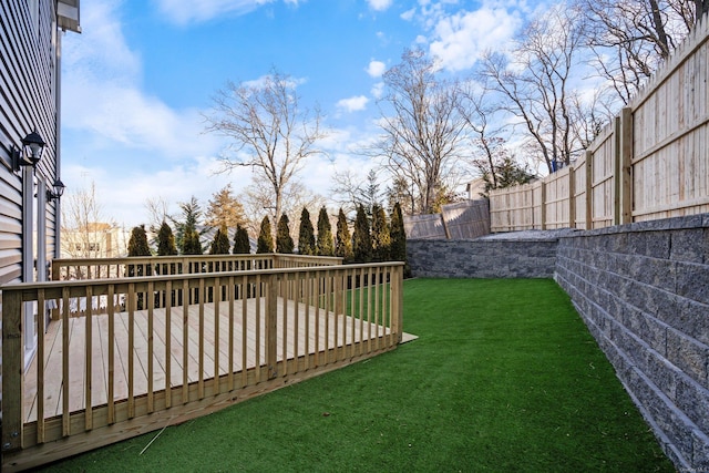 view of yard featuring a deck