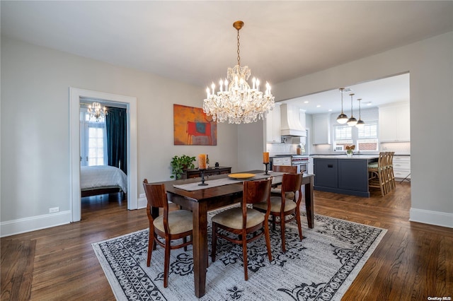 dining room with a chandelier and dark hardwood / wood-style floors