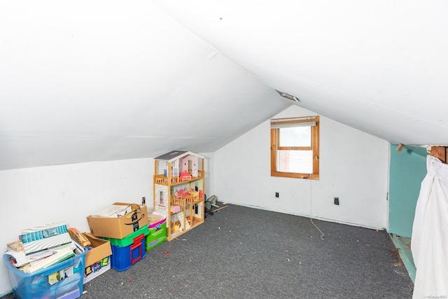 recreation room featuring vaulted ceiling