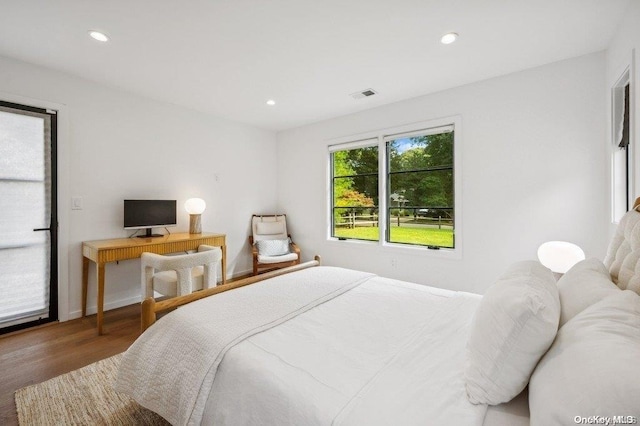 bedroom featuring dark hardwood / wood-style floors