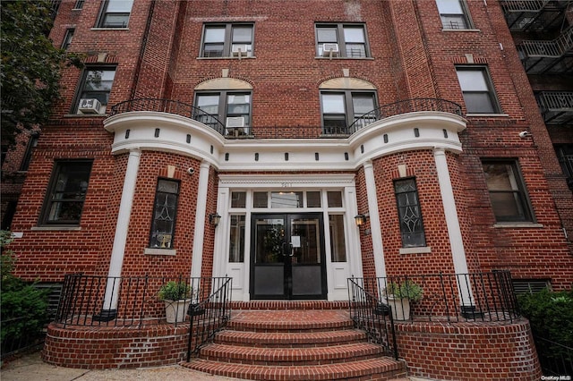 property entrance featuring french doors