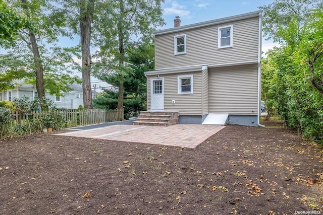 back of property with a patio area