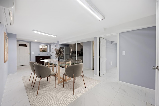 dining room with marble finish floor and baseboards