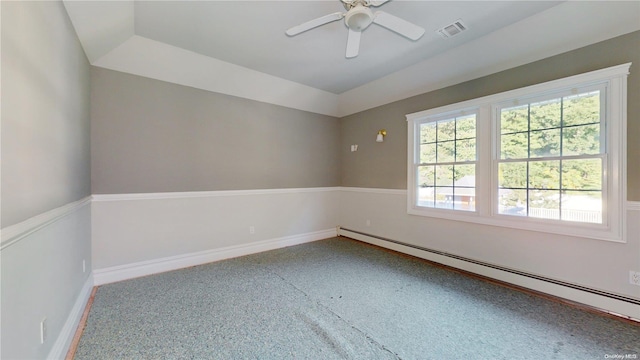 empty room featuring baseboard heating and ceiling fan