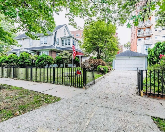 33-02 Parsons Blvd, Flushing, NY 11354 - view of front of house featuring a detached garage and a fenced front yard