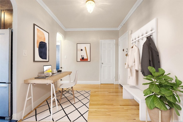 mudroom featuring hardwood / wood-style flooring and ornamental molding